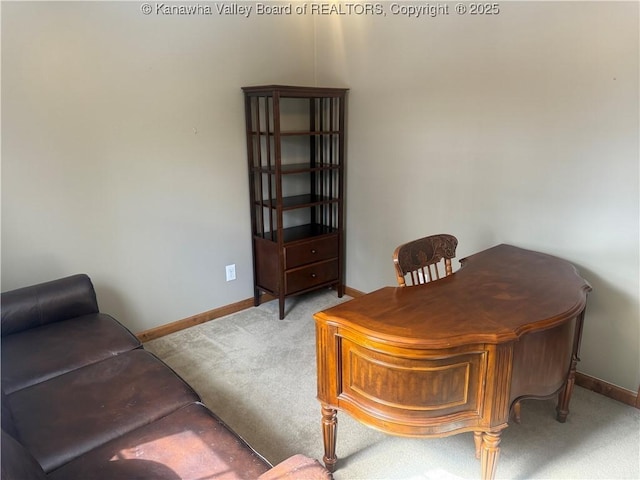 office area with light colored carpet and baseboards