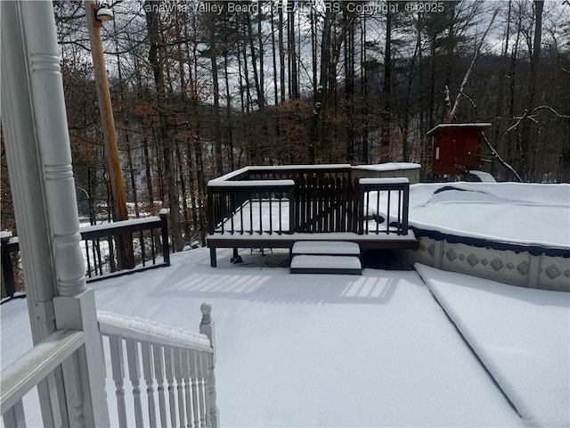 view of snow covered deck