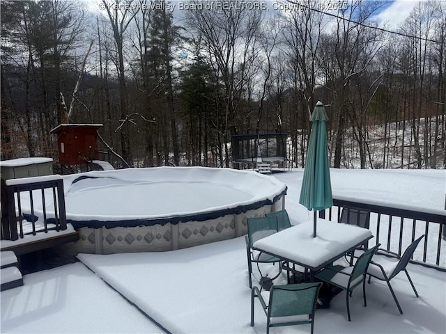 view of yard covered in snow