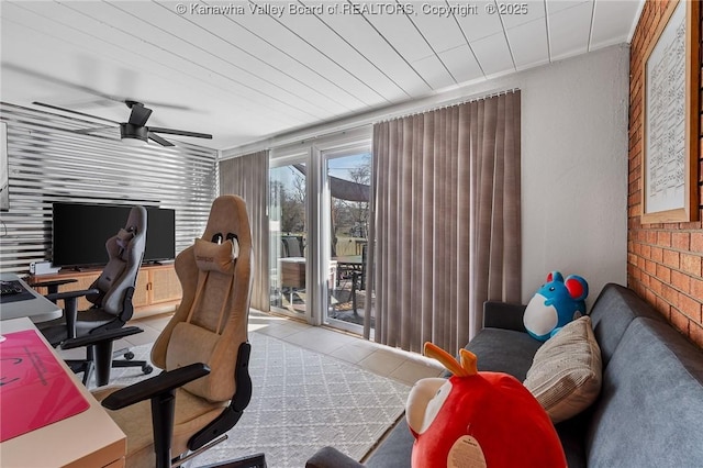 office space featuring ceiling fan and light tile patterned flooring