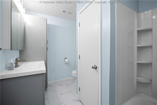 bathroom featuring marble finish floor, bathtub / shower combination, visible vents, a textured ceiling, and vanity