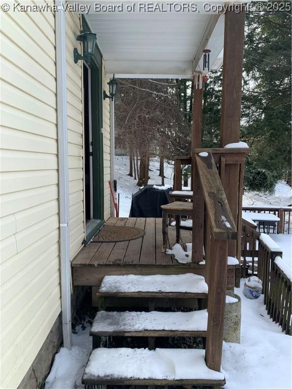 view of snow covered deck