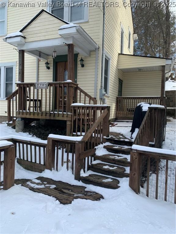 view of snow covered deck