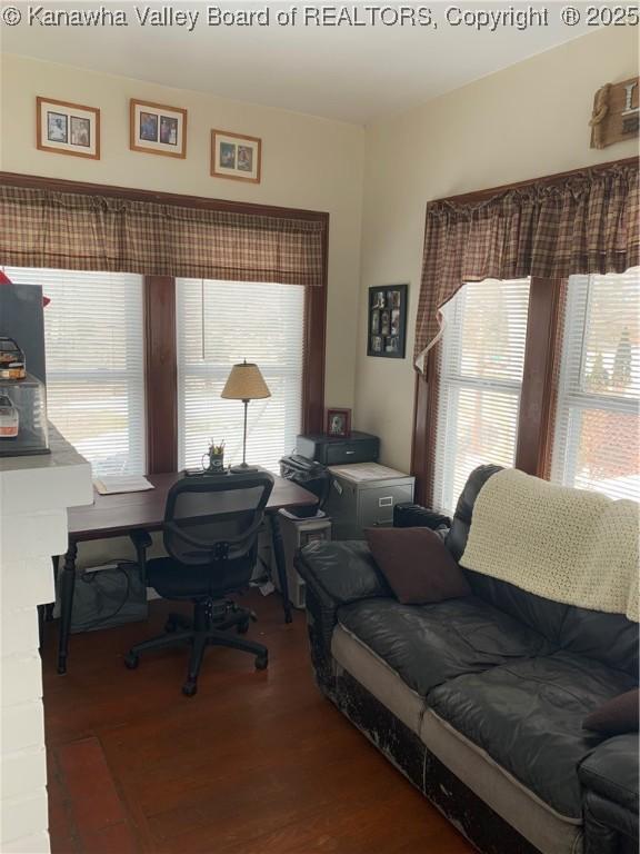 office area with a wealth of natural light and wood finished floors