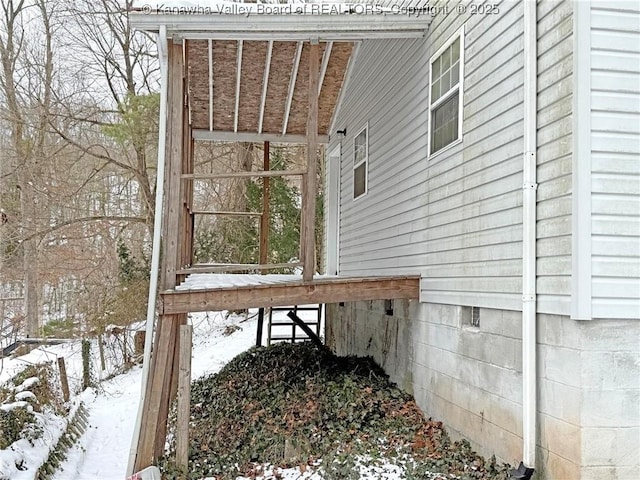 view of snow covered property