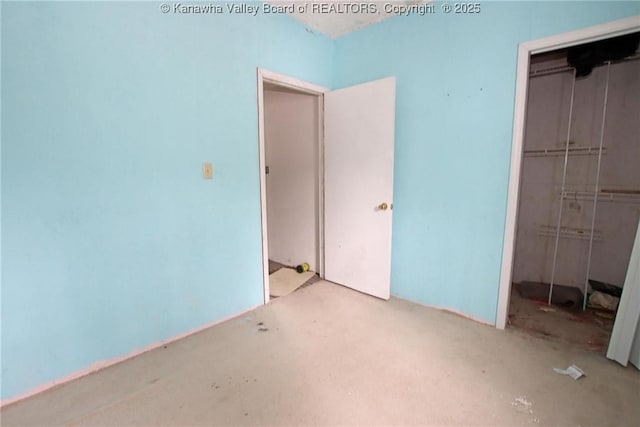 unfurnished bedroom featuring a closet