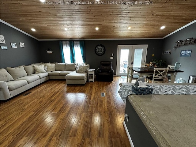 living area with recessed lighting, wood finished floors, wood ceiling, ornamental molding, and french doors