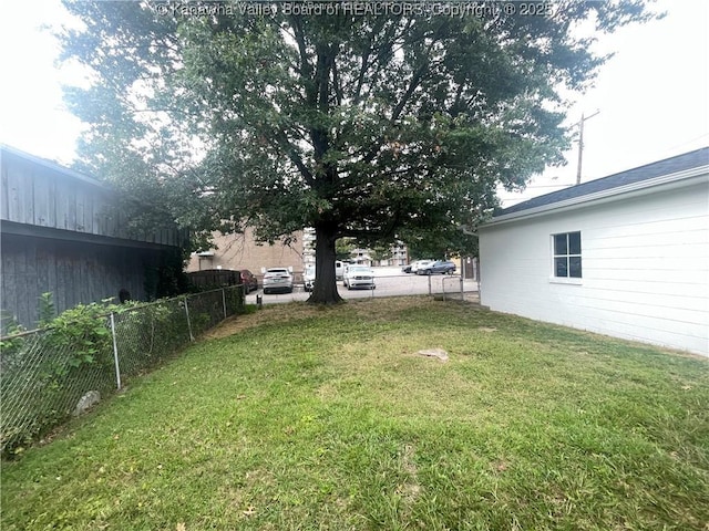 view of yard featuring fence