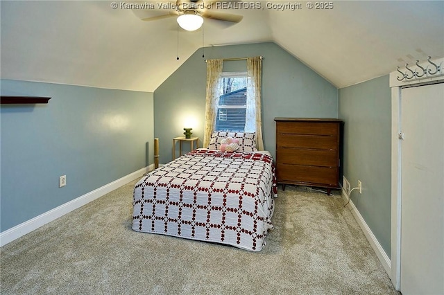 carpeted bedroom featuring lofted ceiling, ceiling fan, and baseboards