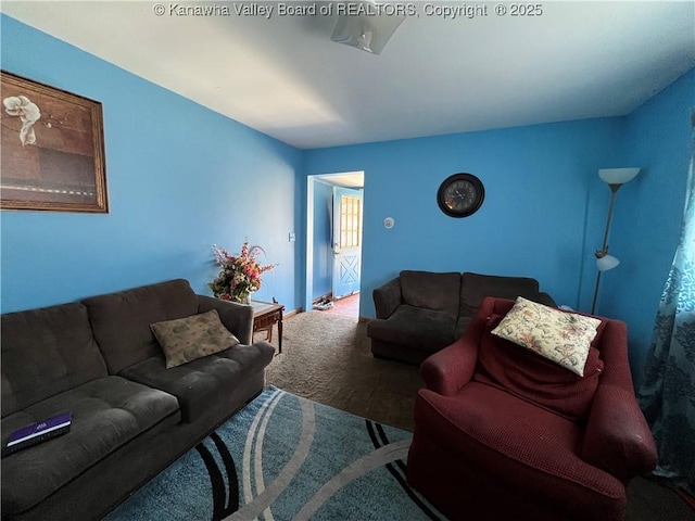 living room featuring carpet flooring