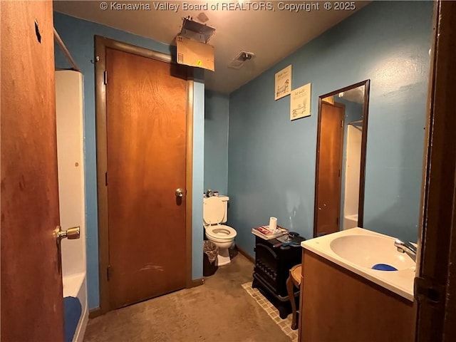 full bathroom with toilet and vanity