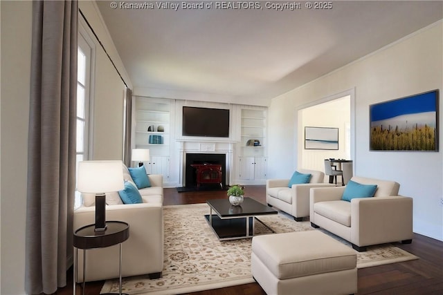 living room with wood finished floors and built in features