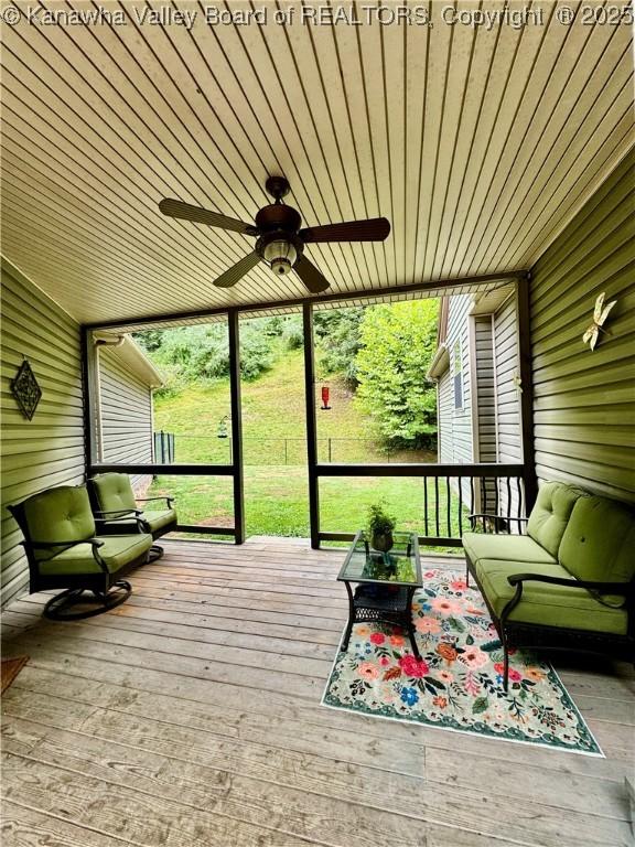 2299 Striker Fork Rd, Chapmanville, WV 25508 - sunroom with a ceiling fan