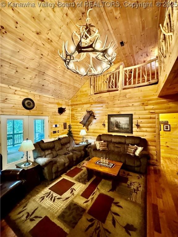 2299 Striker Fork Rd, Chapmanville, WV 25508 - living room with rustic walls, wooden ceiling, high vaulted ceiling, and hardwood / wood-style flooring