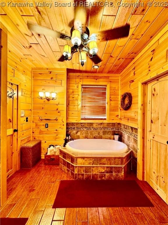 2299 Striker Fork Rd, Chapmanville, WV 25508 - full bath with a garden tub, wooden ceiling, wood walls, and hardwood / wood-style floors