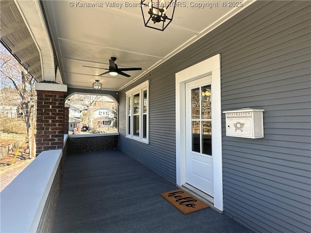 view of patio / terrace featuring a ceiling fan and covered porch