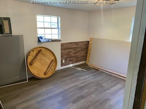 empty room featuring wood finished floors