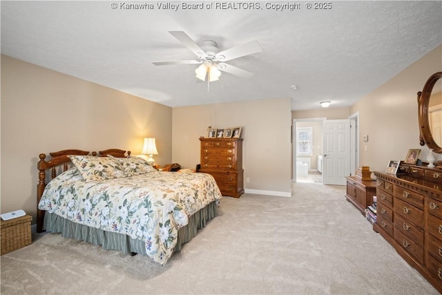 bedroom featuring baseboards, a ceiling fan, and light colored carpet