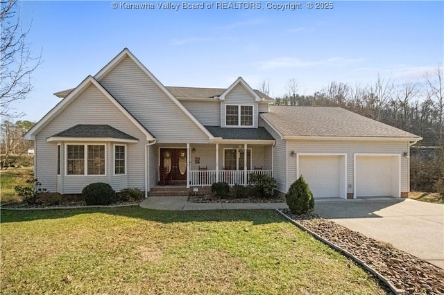 traditional-style house with an attached garage, concrete driveway, a porch, and a front yard