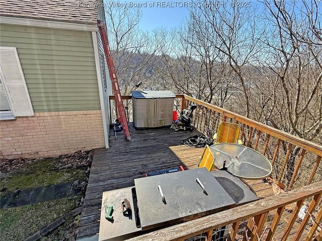 wooden terrace featuring outdoor dining area