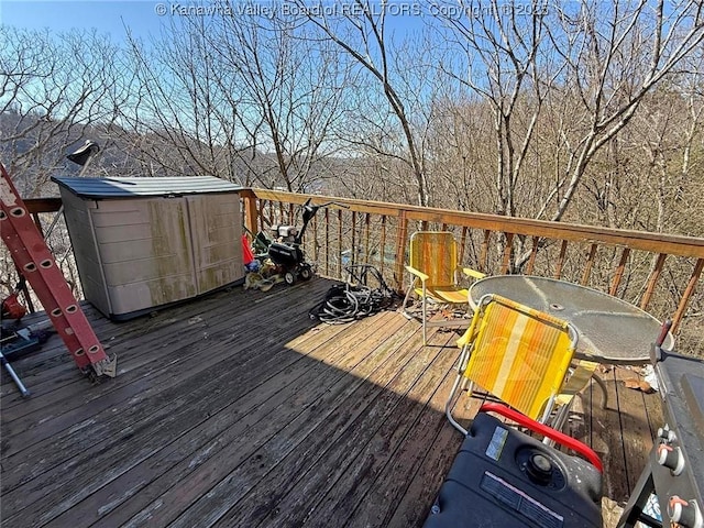 wooden deck with outdoor dining area