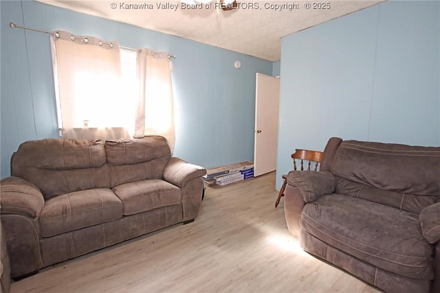 living area featuring wood finished floors