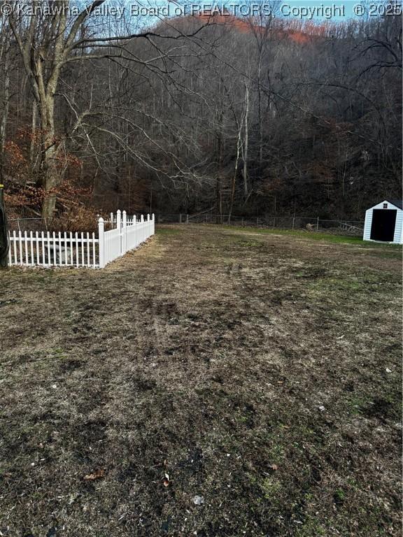 view of yard with fence