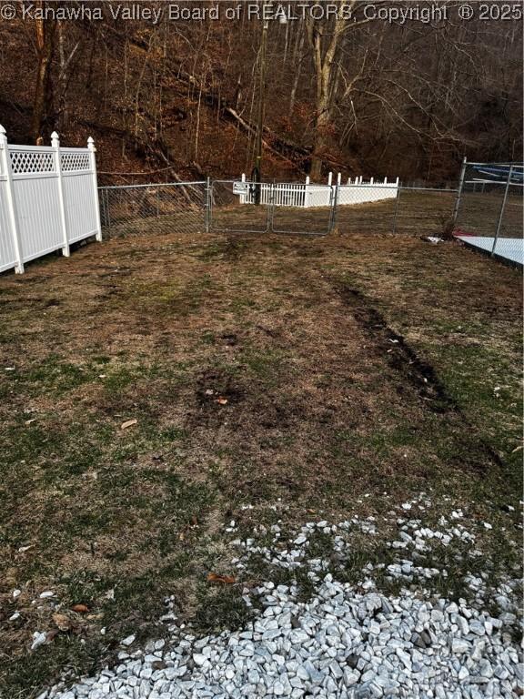 view of yard featuring fence