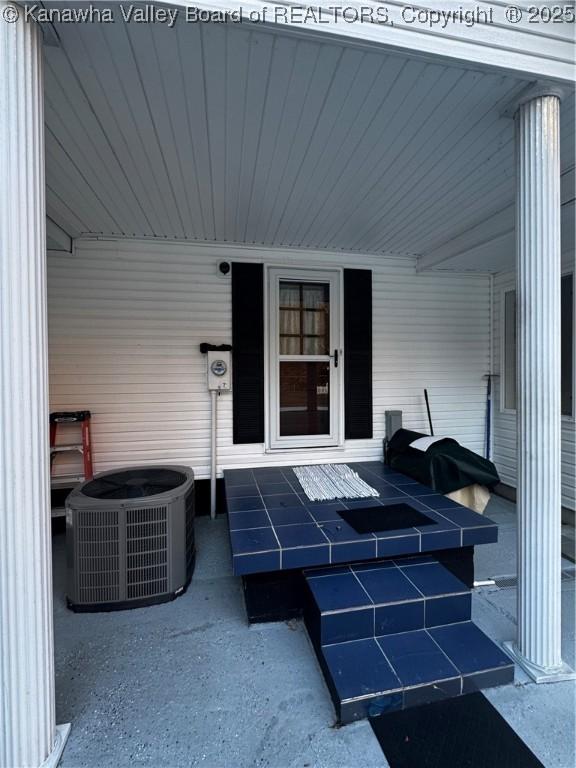 view of patio featuring central air condition unit