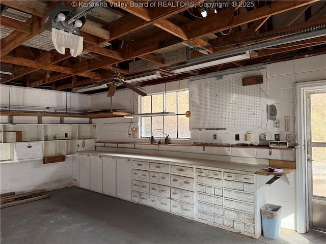 interior space featuring concrete block wall