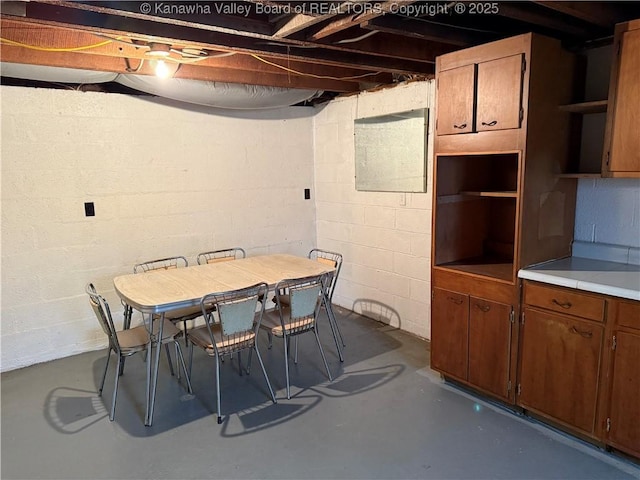 dining area featuring finished concrete flooring