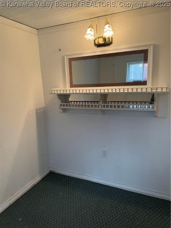 empty room with baseboards