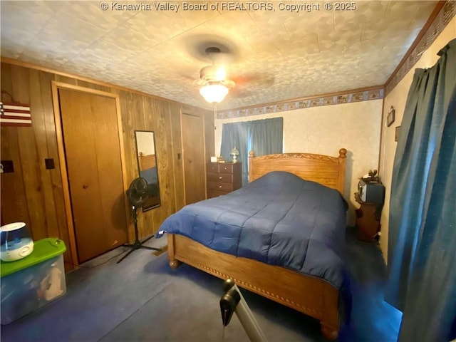 bedroom with wooden walls