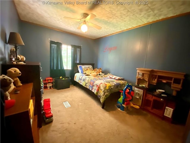 bedroom featuring carpet and ceiling fan