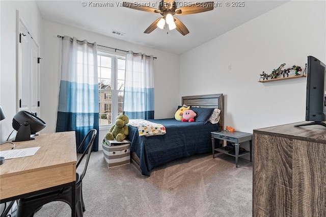 carpeted bedroom featuring visible vents and ceiling fan