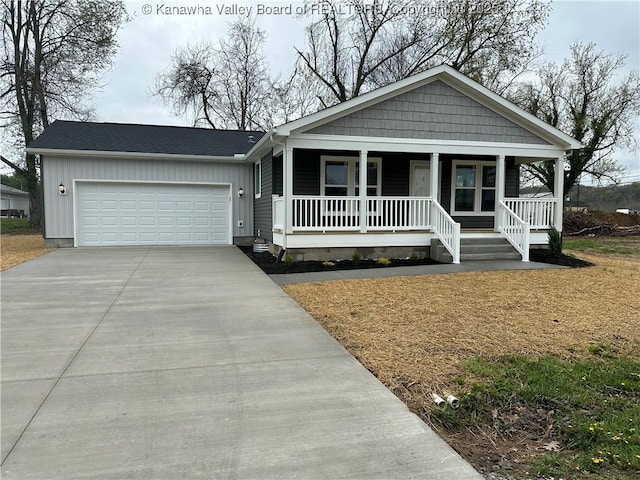 view of front of home with an attached garage, board and batten siding, a porch, and concrete driveway