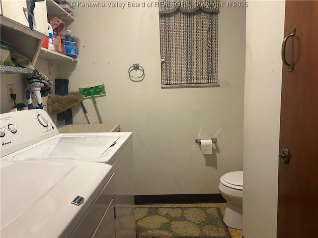 4915 Chesterfield Ave, Charleston, WV 25304 - laundry area with baseboards, washer and dryer, and laundry area