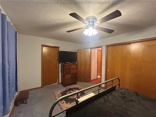 4915 Chesterfield Ave, Charleston, WV 25304 - bedroom with baseboards, a ceiling fan, carpet flooring, and a textured ceiling