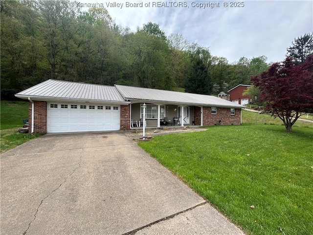4915 Chesterfield Ave, Charleston, WV 25304 - ranch-style home with concrete driveway, brick siding, a front yard, and covered porch