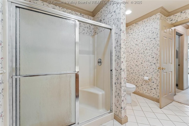 full bathroom featuring ornamental molding, a stall shower, toilet, and wallpapered walls