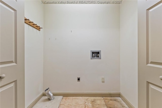 laundry area with hookup for a washing machine, laundry area, hookup for an electric dryer, and baseboards