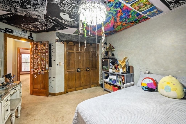 bedroom featuring light carpet and a closet