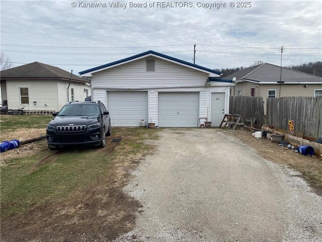 detached garage with fence