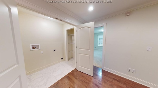 laundry room with hookup for a washing machine, ornamental molding, hookup for an electric dryer, laundry area, and baseboards