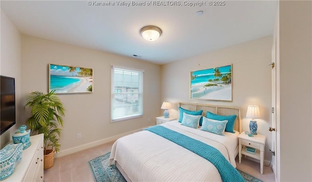 bedroom with visible vents, baseboards, and carpet flooring