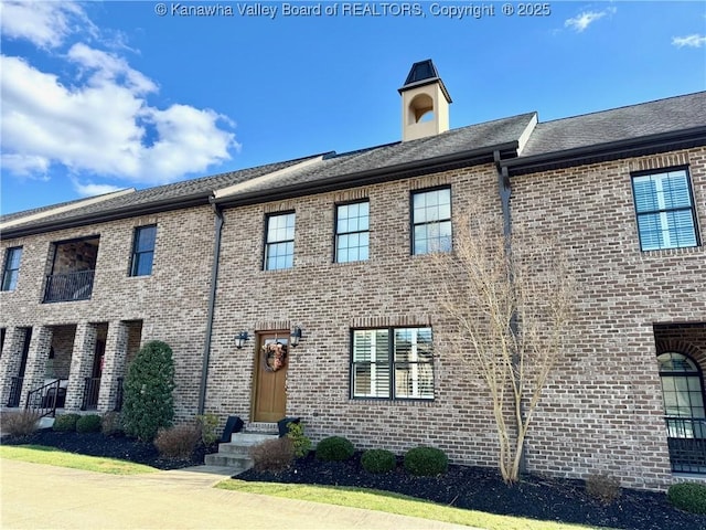 view of front of property with brick siding