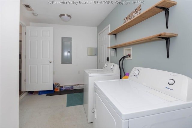 clothes washing area with laundry area, electric panel, visible vents, independent washer and dryer, and light floors