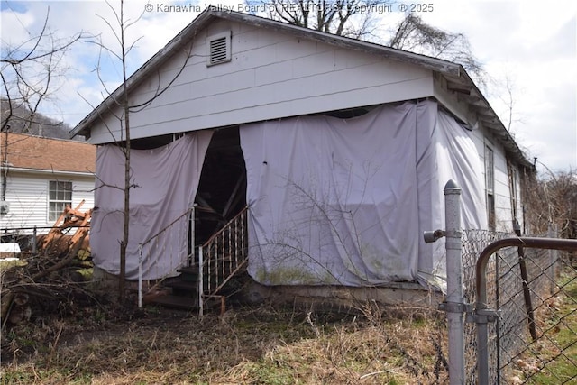 view of property exterior featuring fence