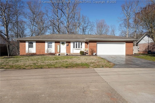 ranch-style home featuring a front yard, brick siding, a garage, and driveway