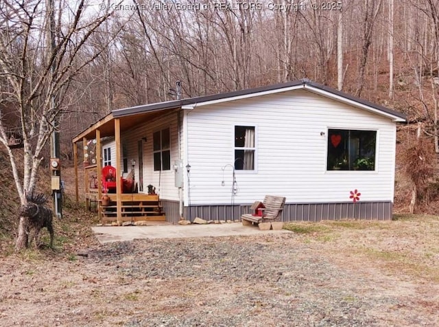 1677 Arnoldsburg Rd, Spencer, WV 25276 - manufactured / mobile home with a porch